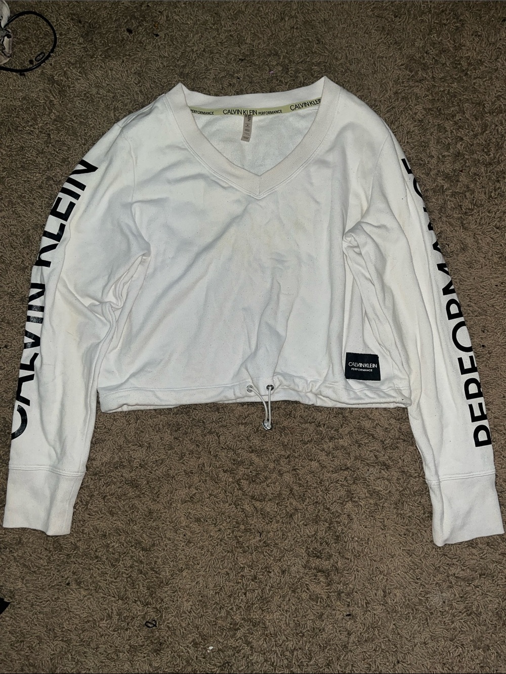 Calvin Klein White V-Neck Cropped Performance Sweatshirt with Sleeve Logo